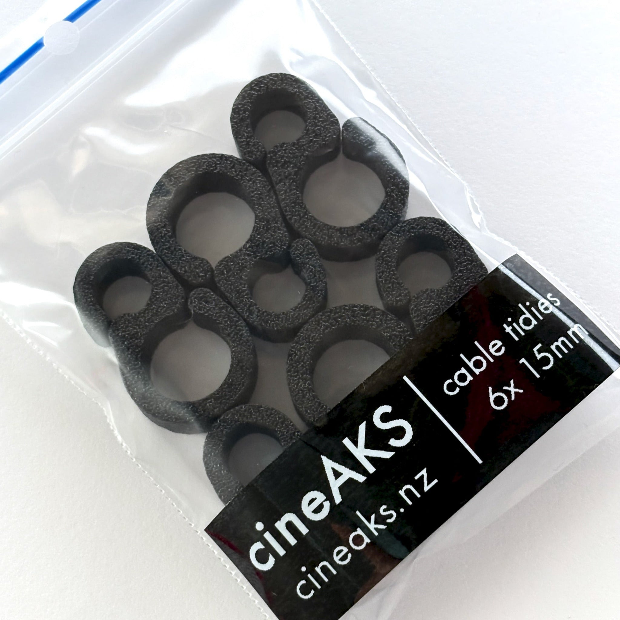 set of 6 cineAKS Cable Tidies cable management clips in packaging