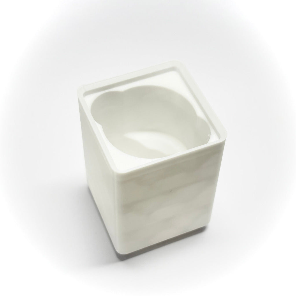 A square white 1x1x8 Gridfinity bin for 25mm wide cforce gear, shown from an elevated angle on a white background with a soft shadow.