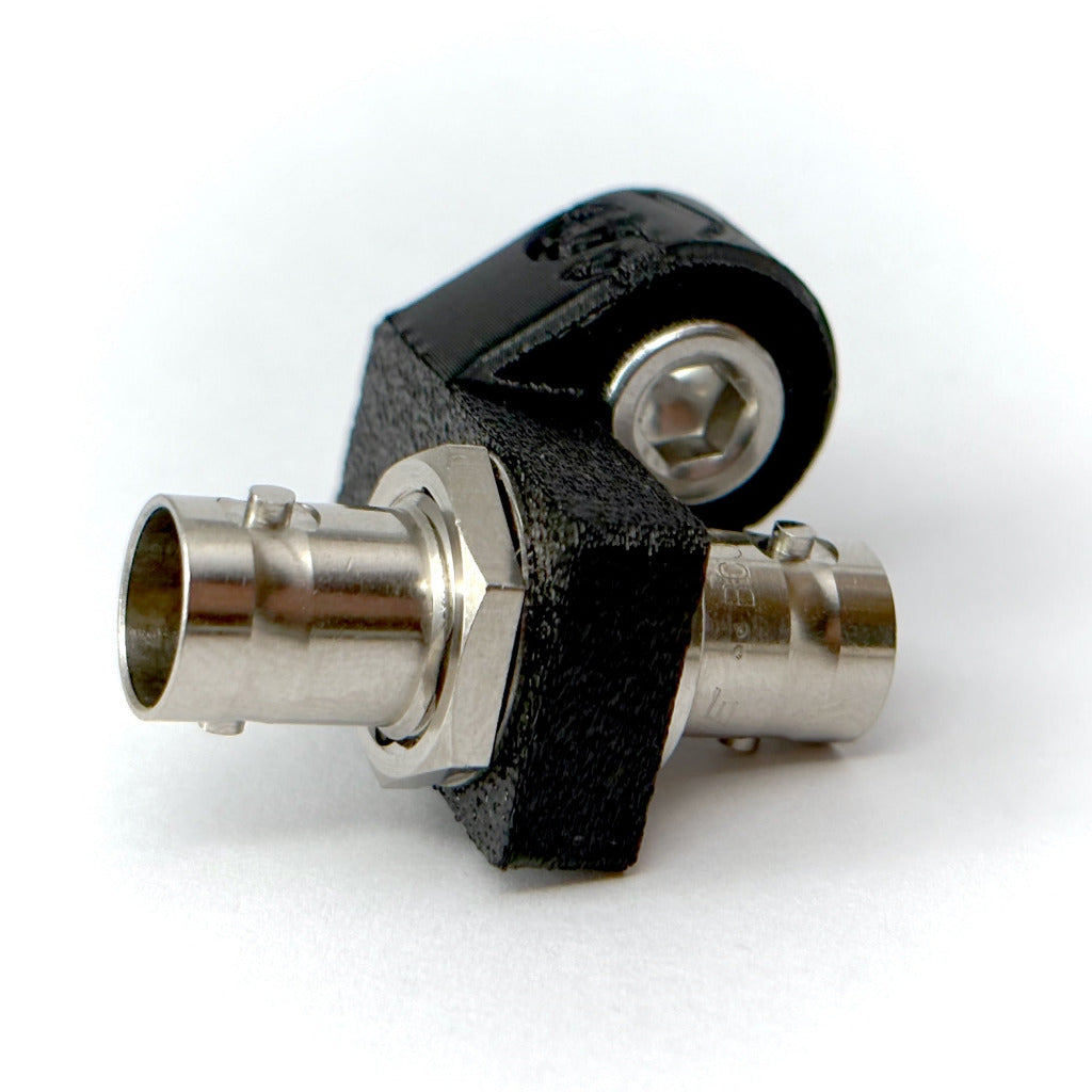 Canare 12G-SDI standoff in black bracket on white background