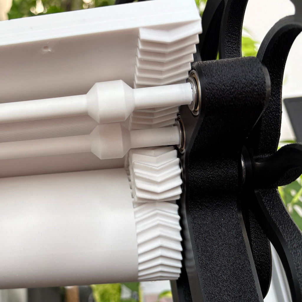 3d printed herringbone gears on a pringint press