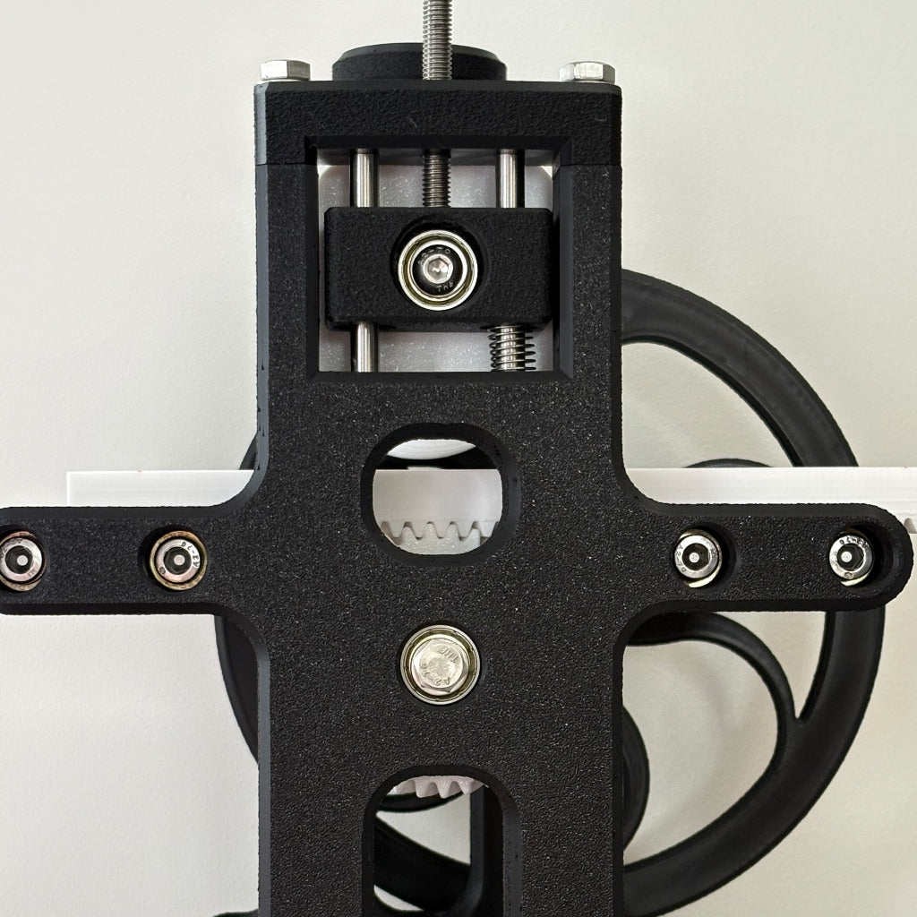 close up of 3d print etching press with geared bed