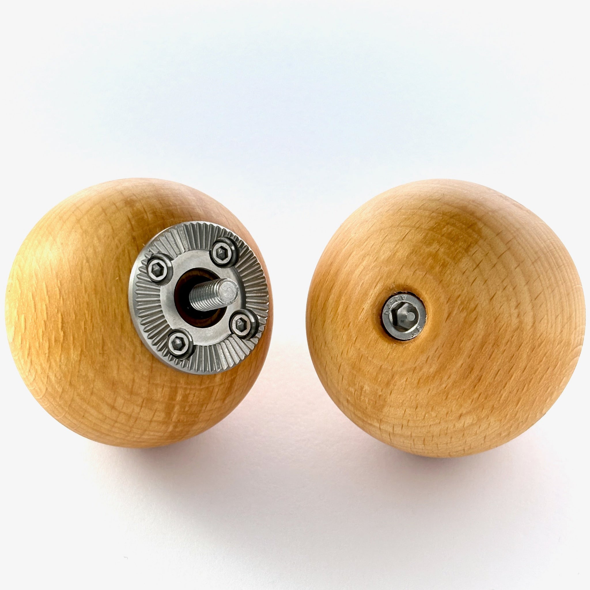 Pair of wood camera grips, ball shaped, made from European Beech.