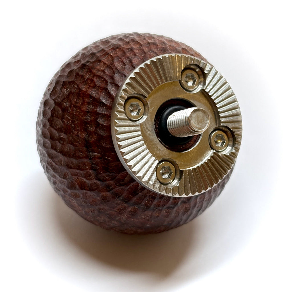 Wooden hand carved camera ball grip with metal arri rosette on a white background
