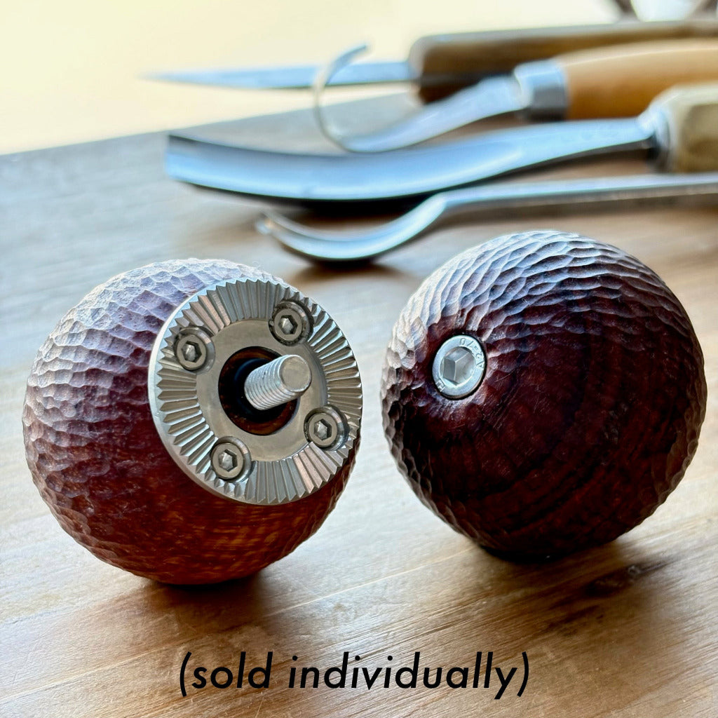 Two wooden camera ball grips with metal arri rosettes on a wooden surface with text "sold individually"