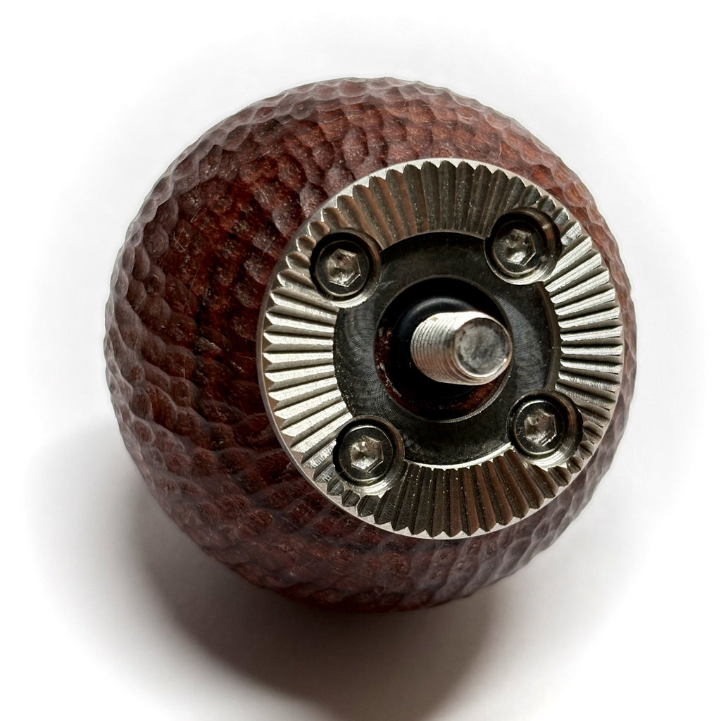 Brown textured wood sphere camera grip with arri rosette on a white background