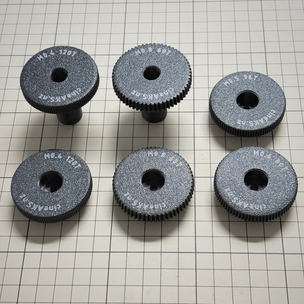 cineAKS cforce Offset Kit with 6 direct-fit offset and extra-offset lens gears, on a beige grid background.