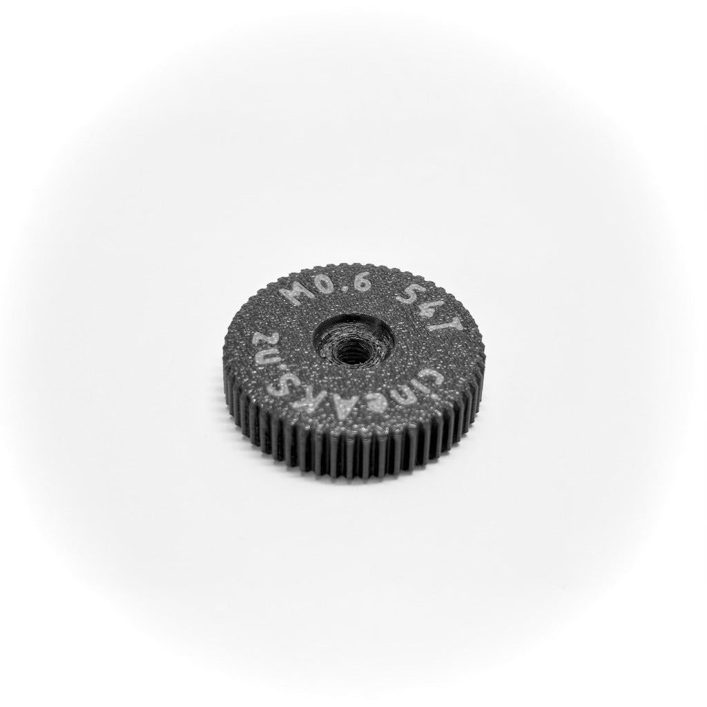 54t M0.6 cine lens gear for Panavision zoom and Fujinon focus and zoom lenses, on a white background