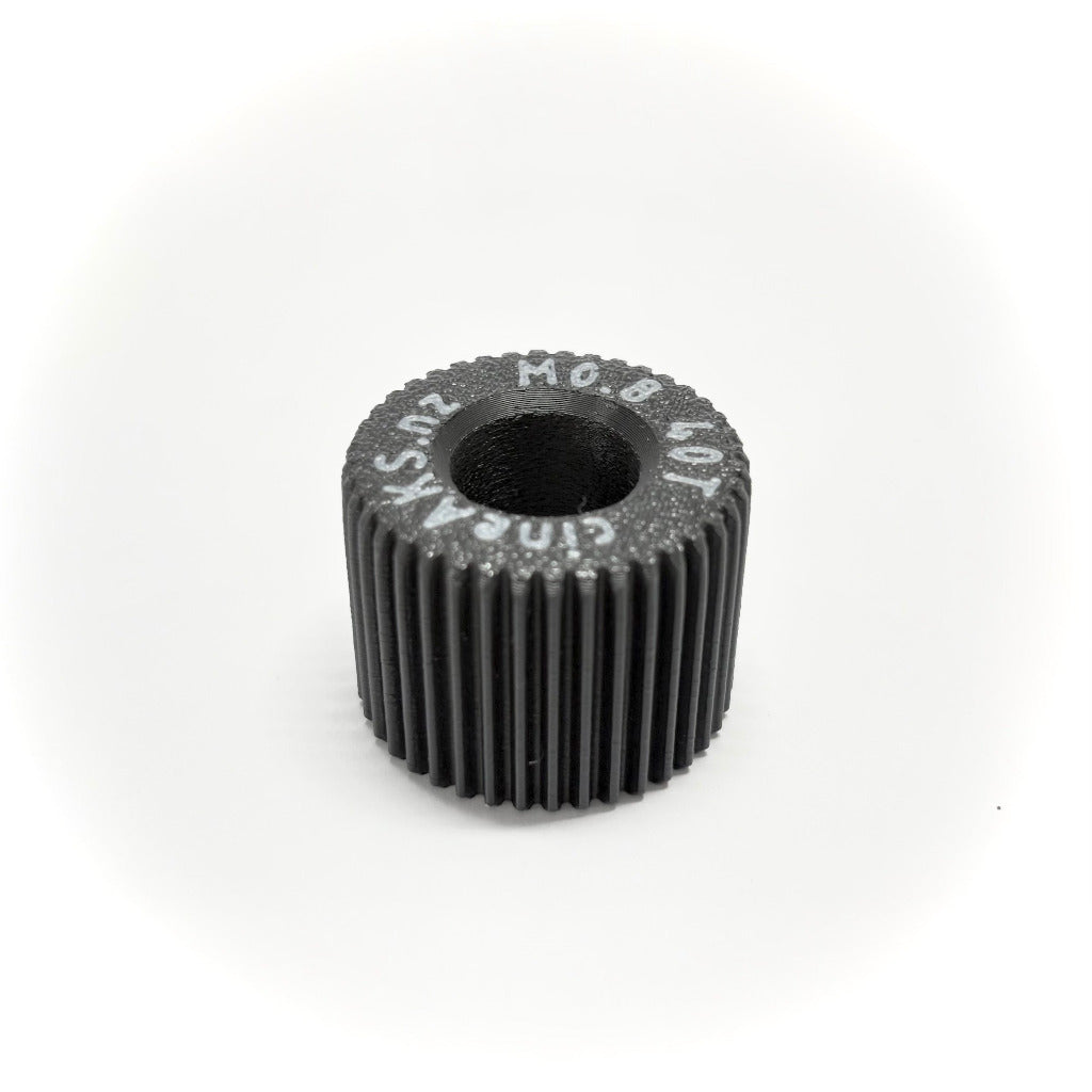 cineAKS 25mm wide M0.8 40T direct fit lens gear for ARRI cforce mini and CLM-5 motors on a white background