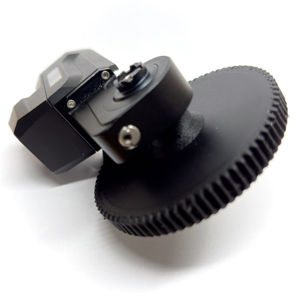 arric cforce mini motor with offset gear on it on a white background