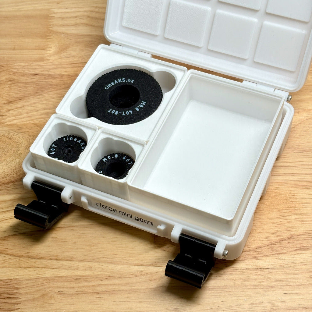white pelican style case with gridfinity dividers for arri cforce mini gears on a wooden surface