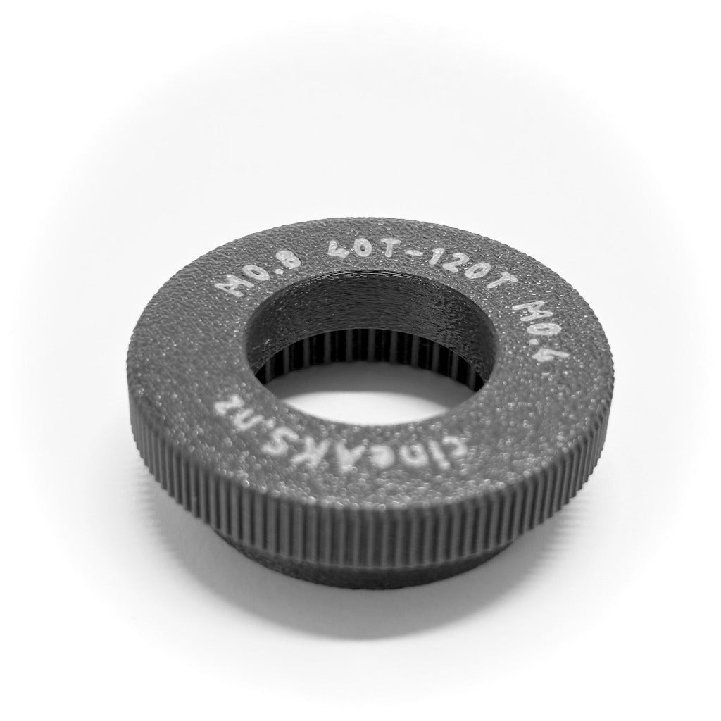 m0.8 40t to Panavision M0.4 120T offset push-on lens gear for ARRI cforce Mini, on a white background
