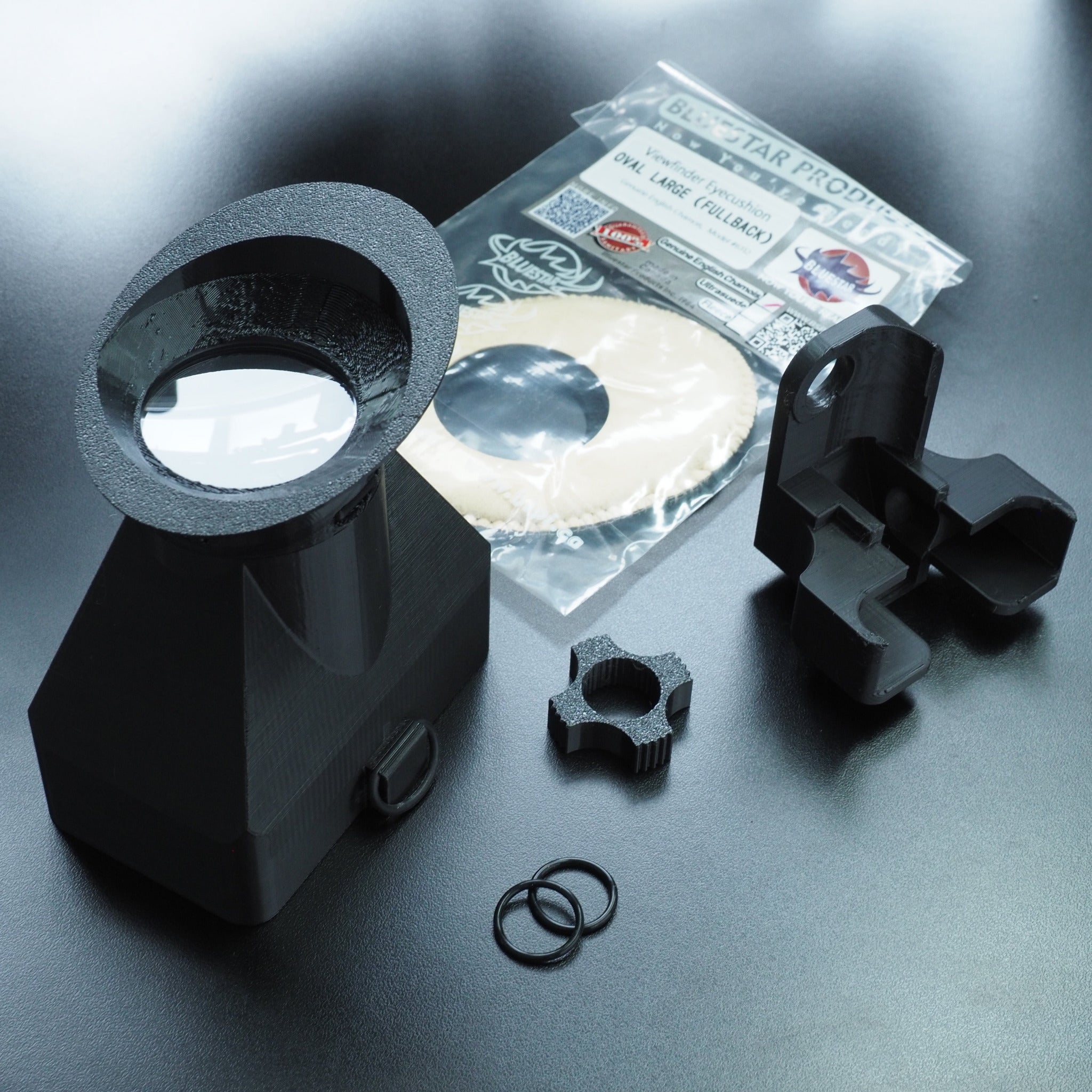 Parts laid out for the cineAKS Sony FX6 viewfinder kit