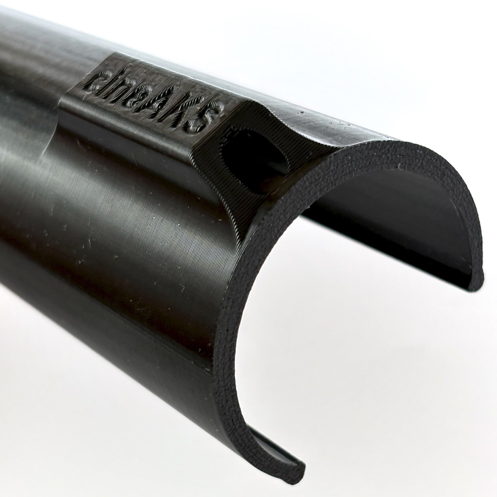 cineAKS speed clip detail shot showing the clip geometry. On a white background.