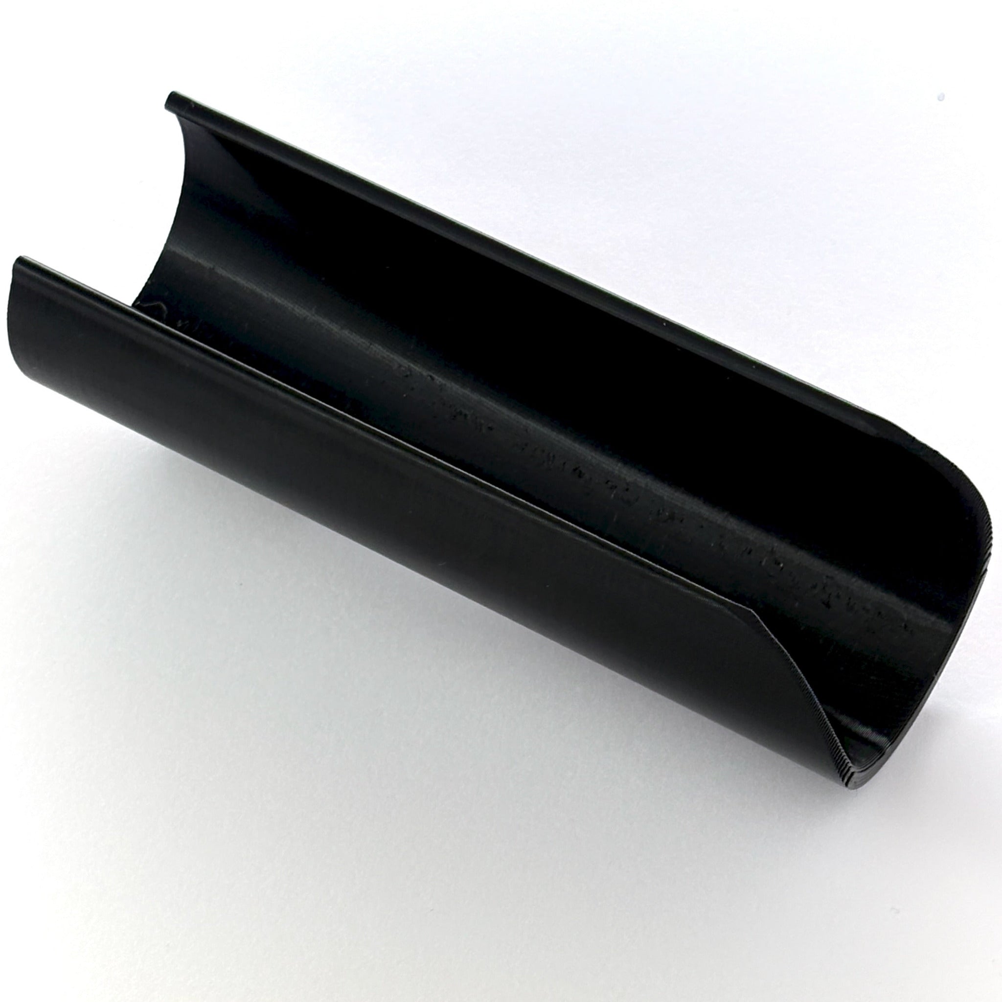 Speed clip for 48.3mm scaff pipe laying on a white background