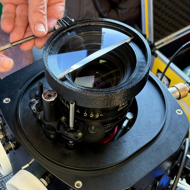 Split diopter held by custom clamp to cooke S4 lens in underwater housing